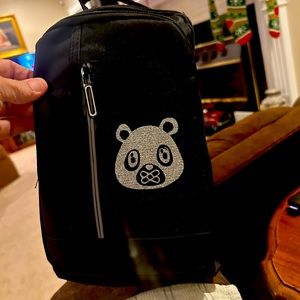 Ownyc bag with charger. In new condition. I won it and have not used it.